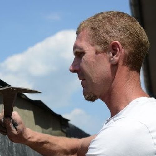 Zijkant-bekleden-met-shingles Dakdekker Mill met nokvorsten